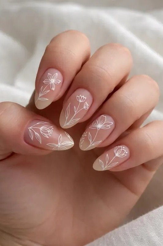 White Floral Almond Nails - nude nail art idea for women over 40