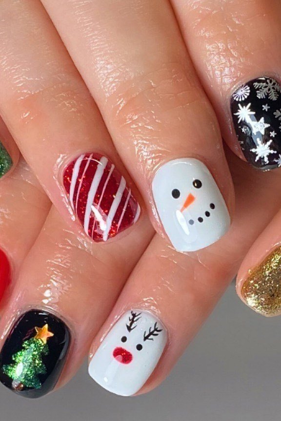 Dark Glitter Nails with Snowman, Reindeer and Tree Art, fun winter nail idea for women over 60