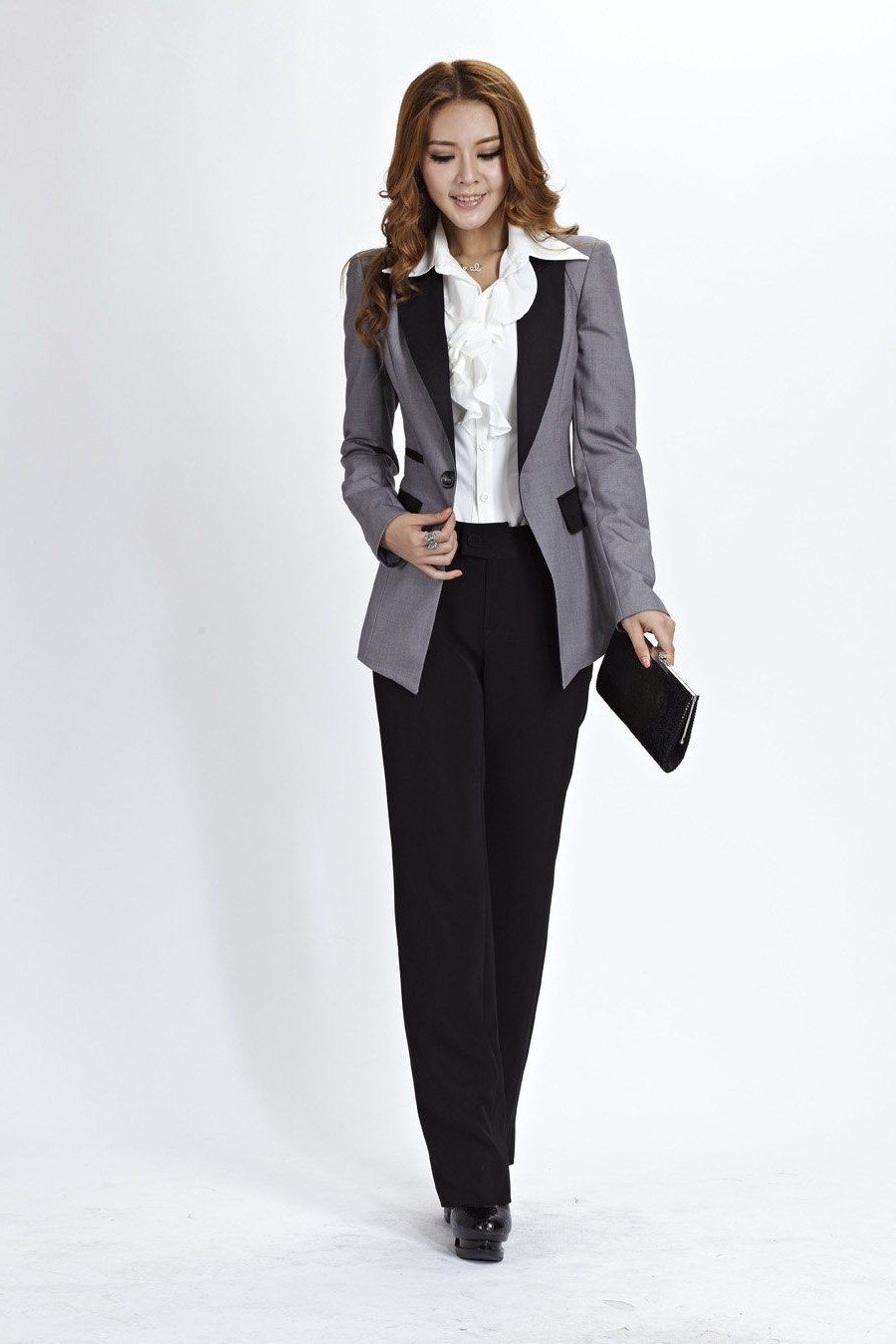 Work outfit for women over 40: gray blazer with black wide-leg trousers