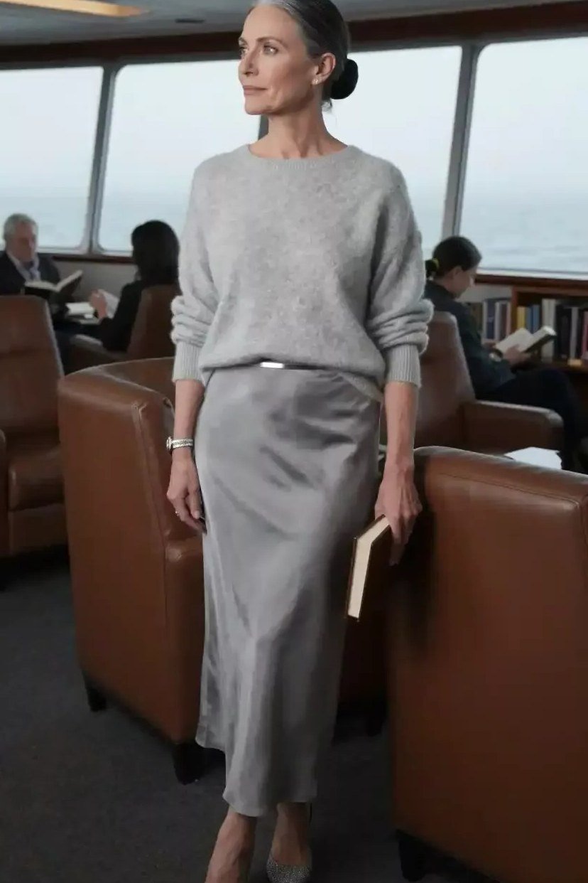 grey knit top with grey satin midi skirt, elegant monochrome outfit for women over 50