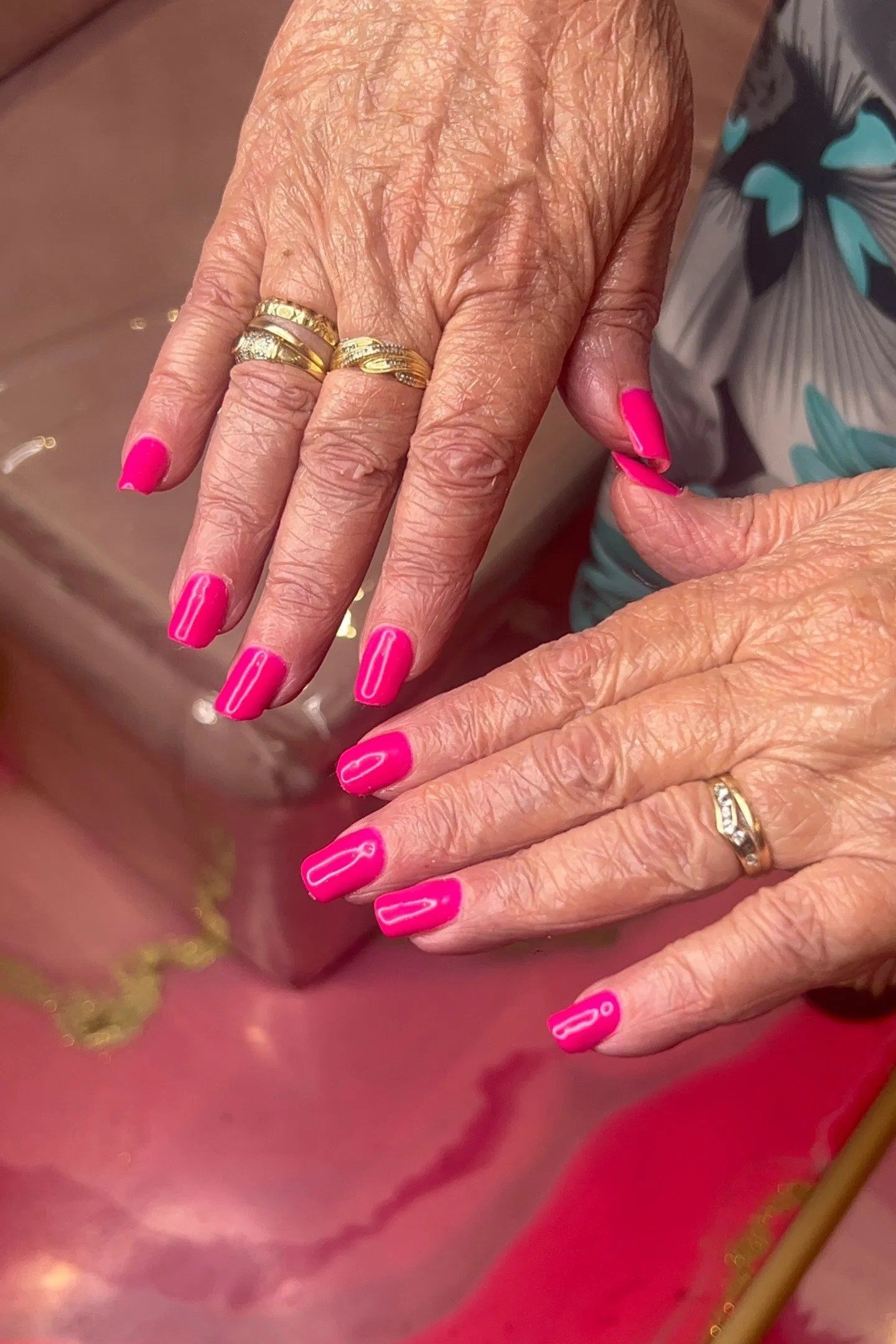 Hot Pink Glossy Manicure for women over 60