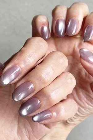gray-lavender chrome ombre almond - winter nail trend for older women