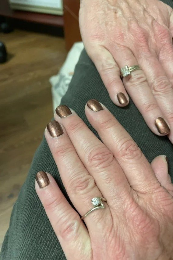 Milky white short squoval fresh - flattering nail design for older women