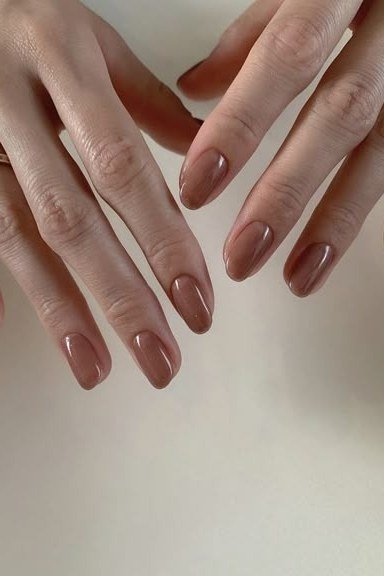 Taupe Glossy Almond Nails - brown nail idea for women over 50