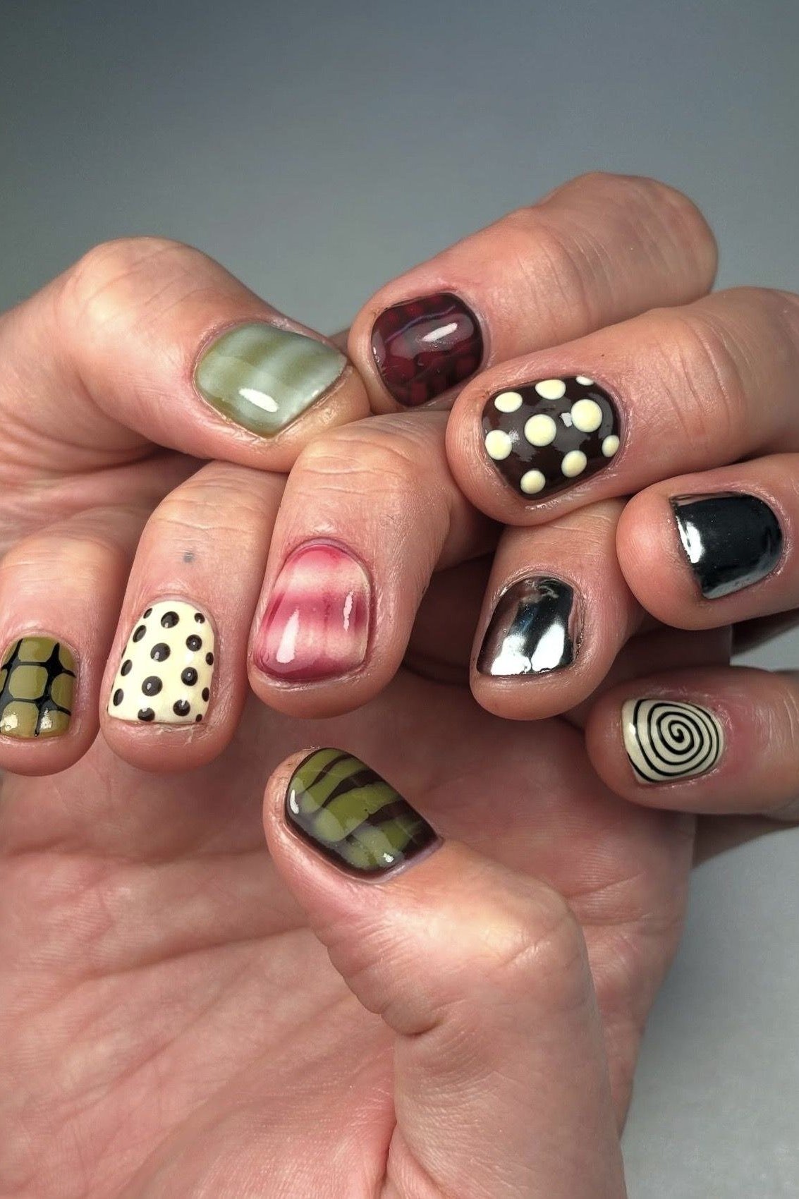 Nail art design for women over 60: mix-and-match dots plaid and olive nail art
