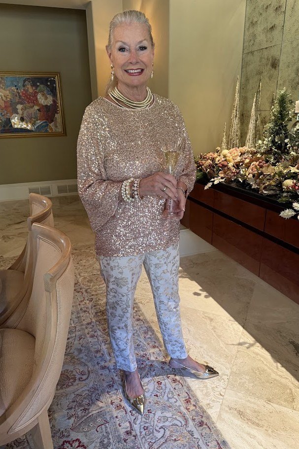 holiday evening outfit for women over 60: gold sequin top for holiday dinner
