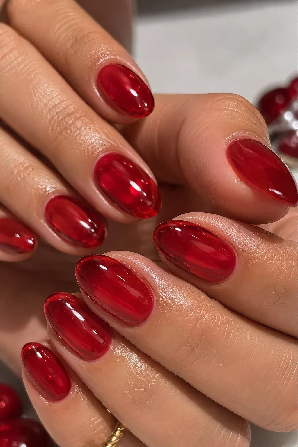 Short oval translucent red jelly nails