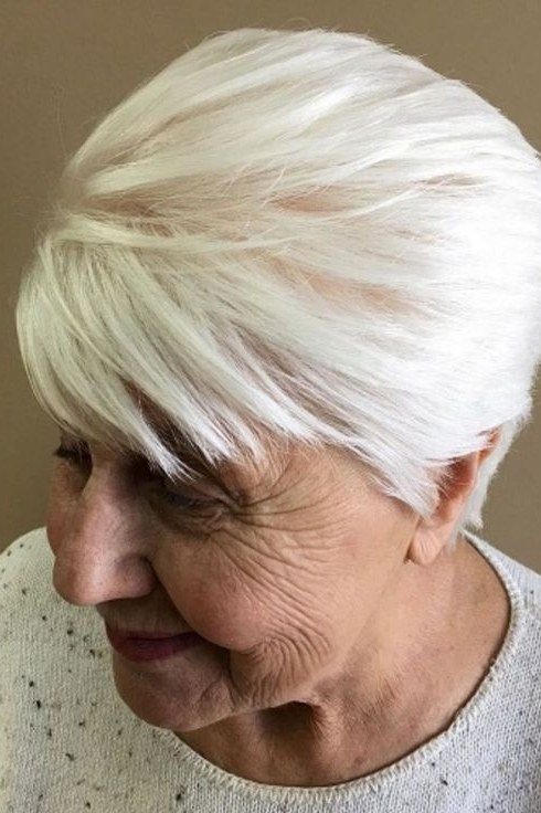 Spiky silver pixie haircut for women over 70, front view