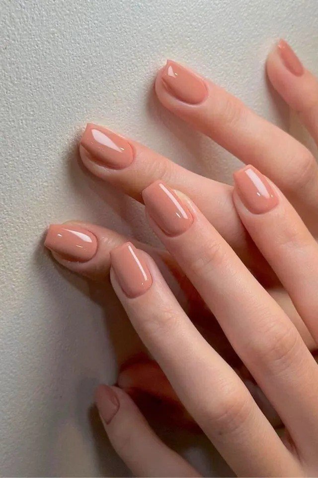 Peachy Nude Medium Hands - elegant nude nail design for women over 60