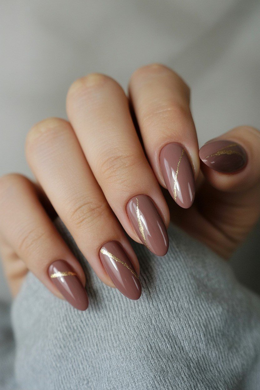 Taupe Almond Nails with Grey Sweater - brown nail idea for women over 50