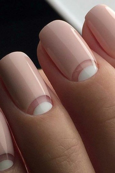 Nail art design for women over 60: nude nails with white half-moon art