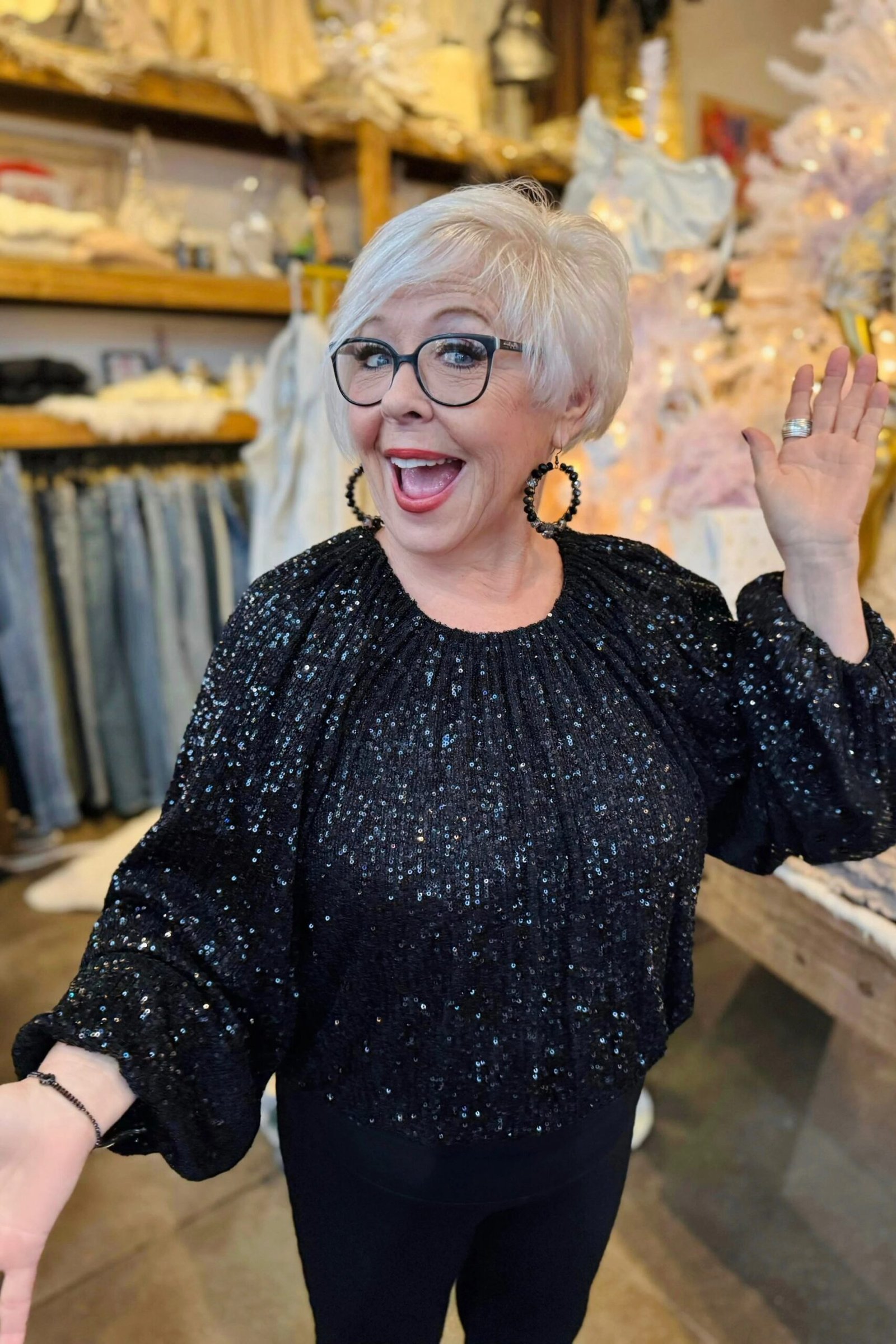 holiday evening outfit for women over 60: black sparkle blouse
