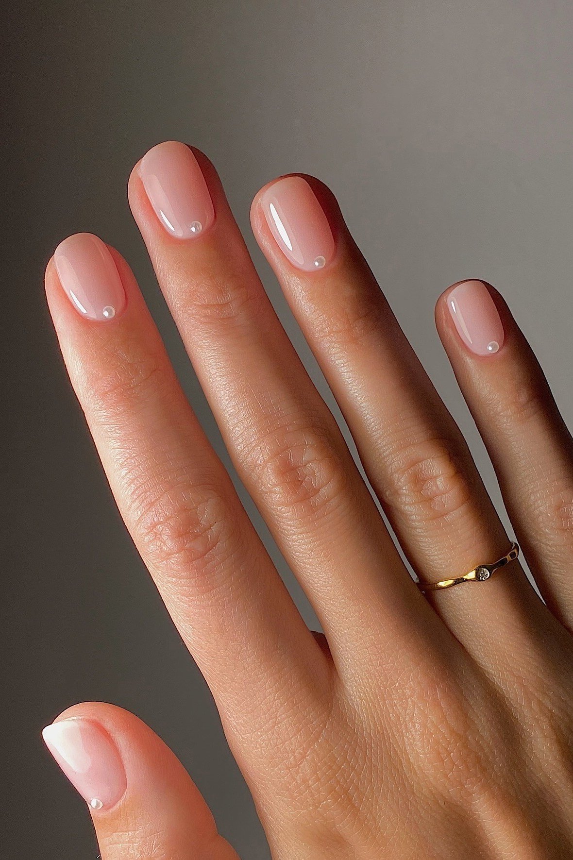 Classic Nude Pink Pearl Short Almond Nails - pearl finish nail idea for women over 60