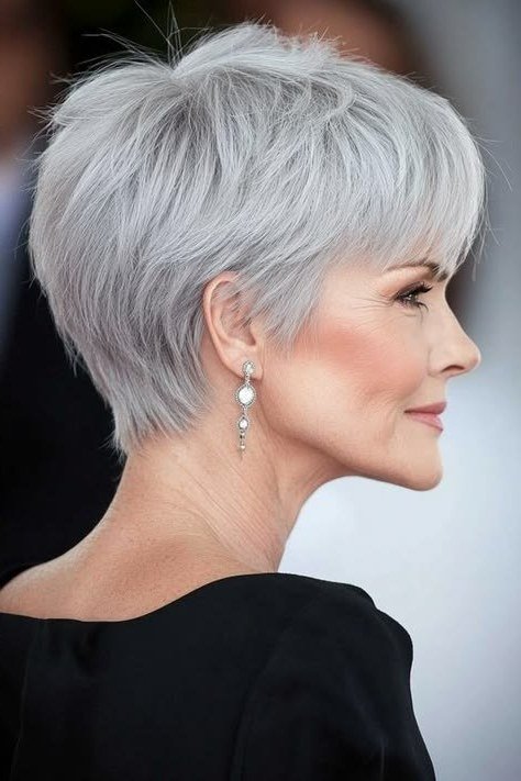 White pixie, profile view, micro pixie cut for women over 60 going silver