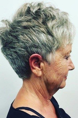 White Pixie with Green Earrings - hairstyle for women over 70