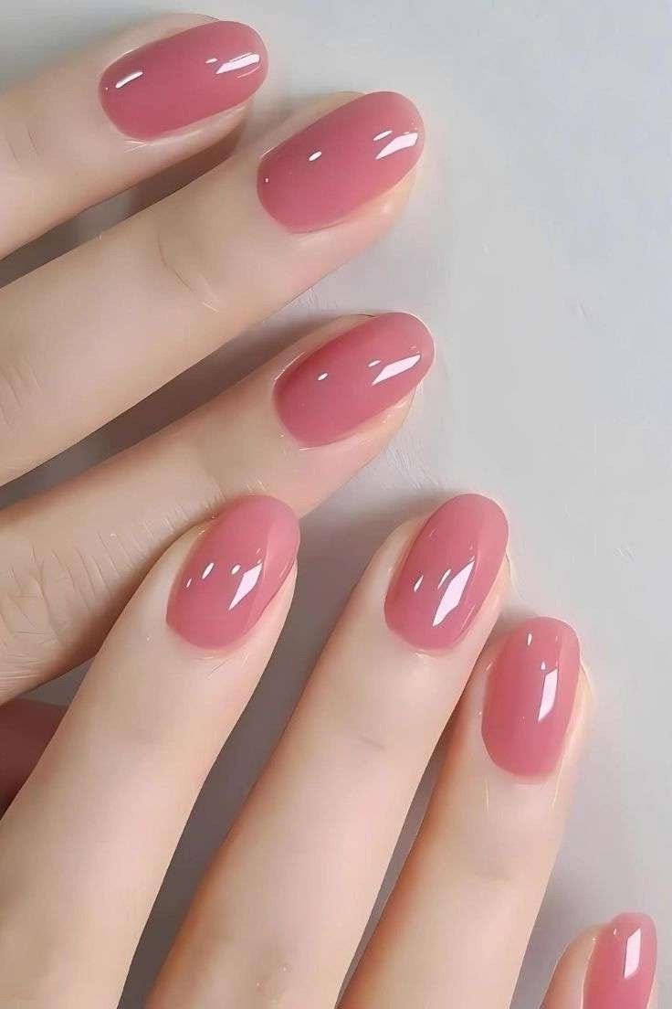short oval, mauve rose pink, flat-lay of two hands , for women over 60