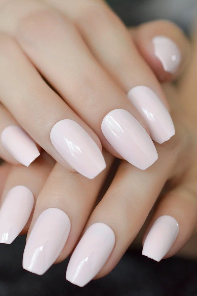 Milky white almond nails, sophisticated nail design for women over 50