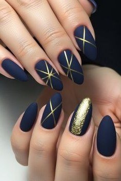 Navy matte with gold starburst line art almond, elegant fall nail design for women over 40
