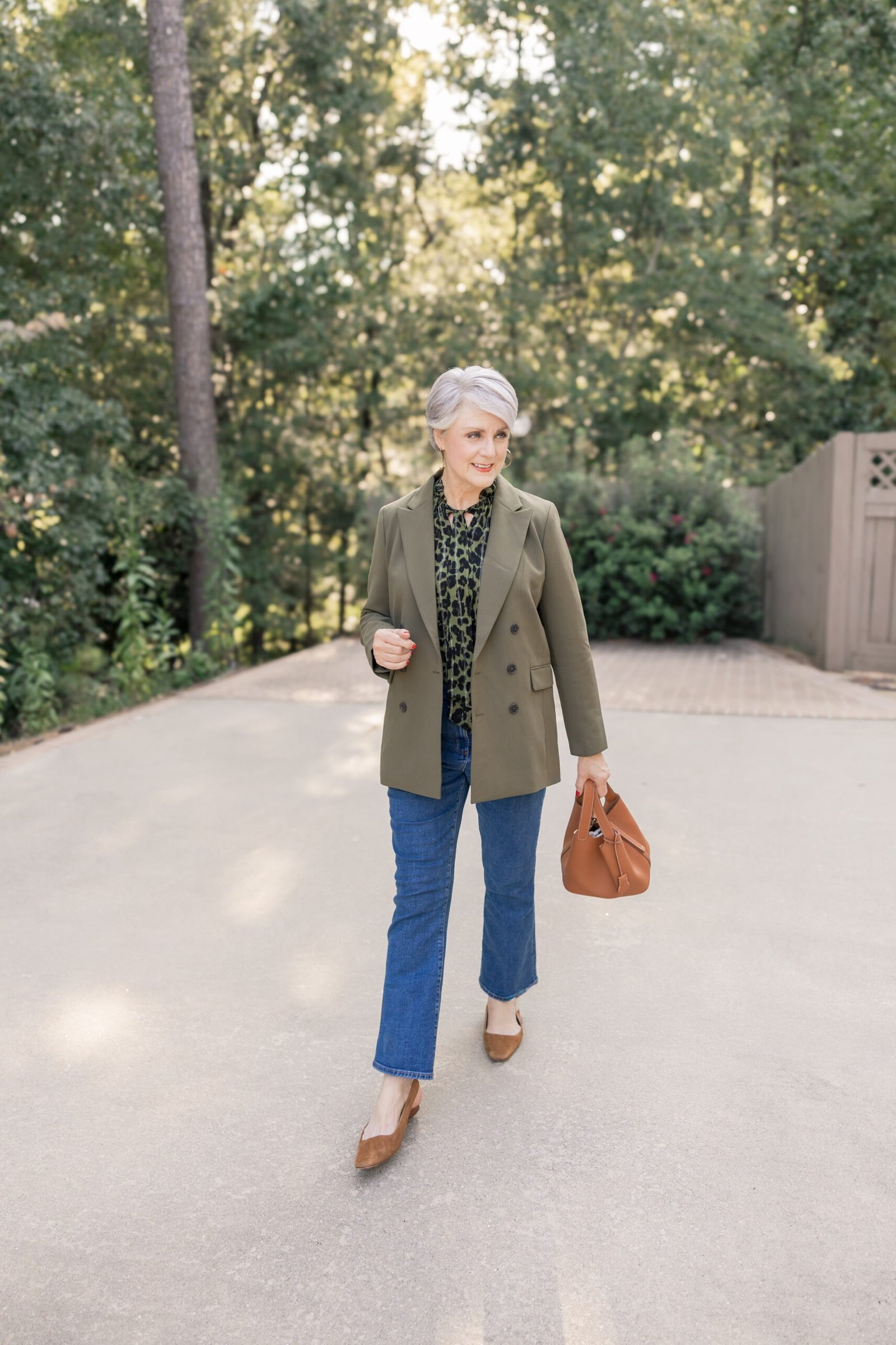 olive blazer and floral blouse fall outfit for women over 60