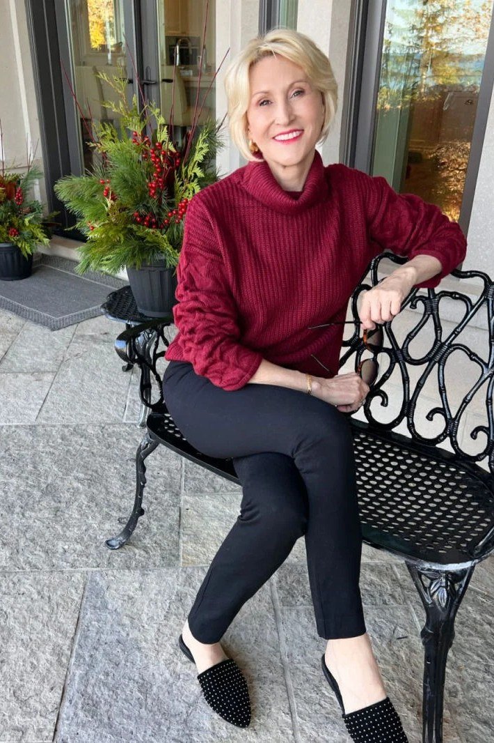burgundy turtleneck sweater black skinny pants polka dot loafers women over 50