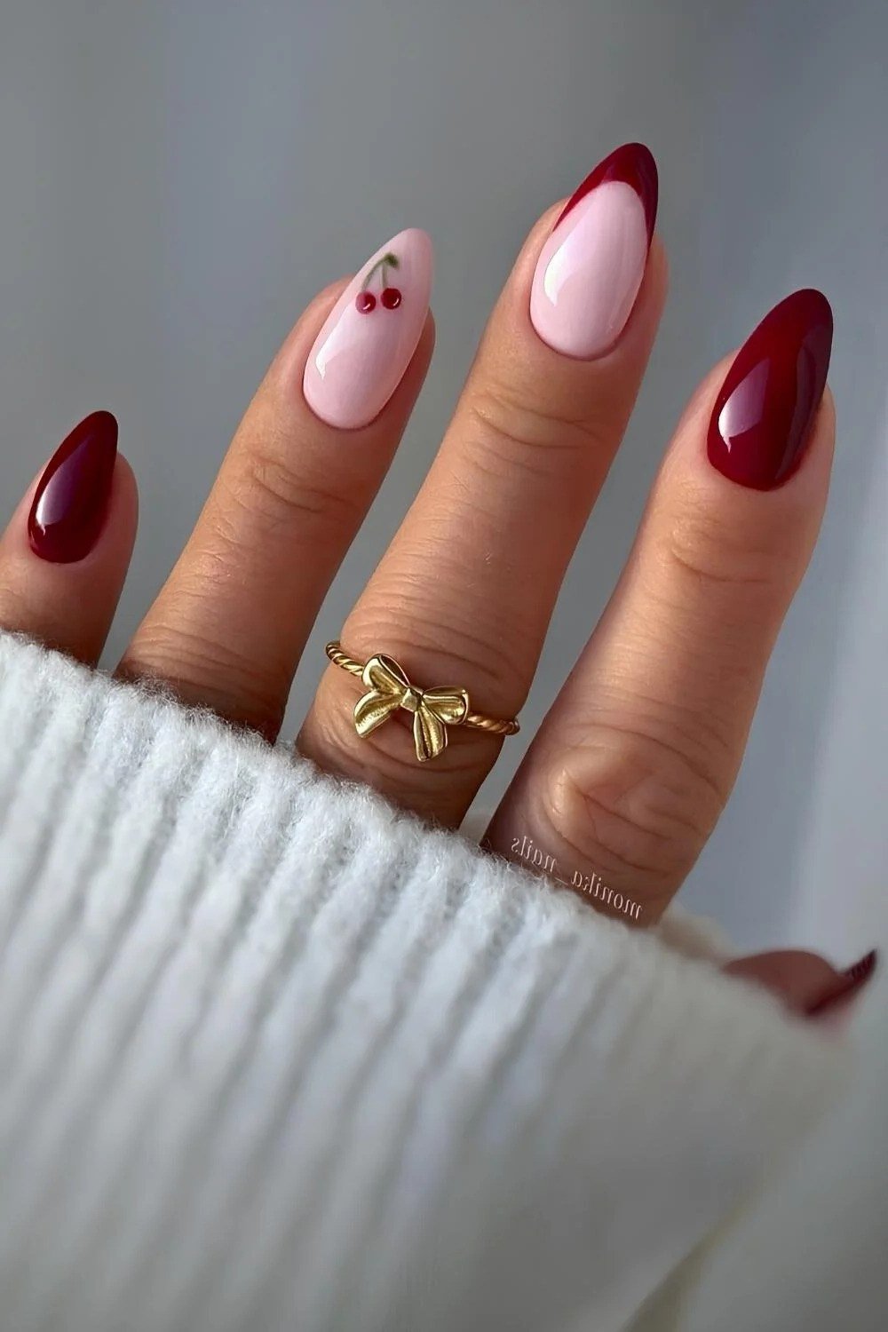 Burgundy french with tiny hearts, burgundy fall nail idea for women over 60
