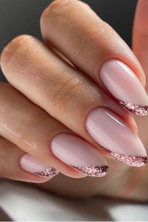 pink glitter french tip almond nails