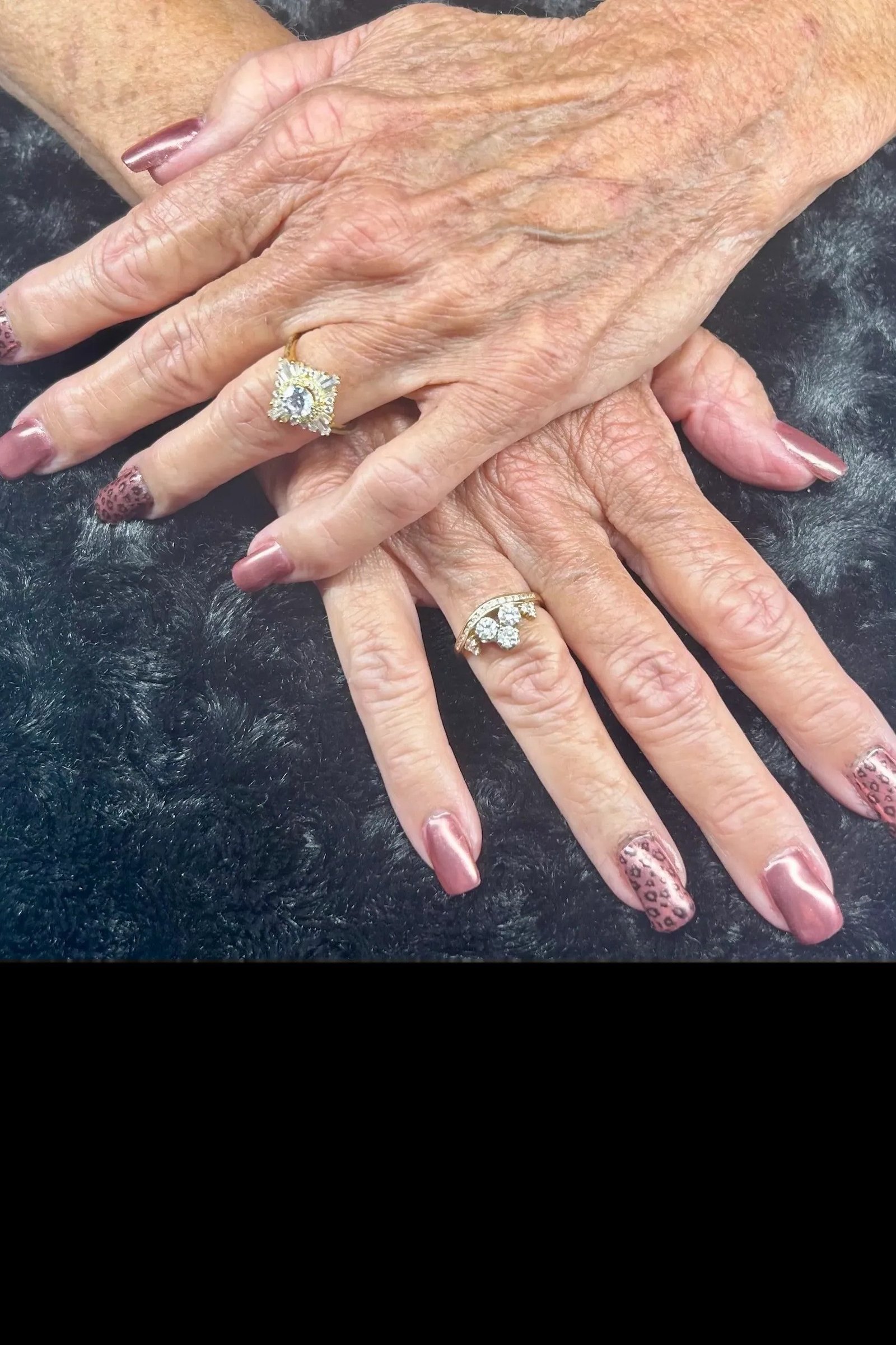 Mauve chrome gel nails with leopard print accent nails for women over 60