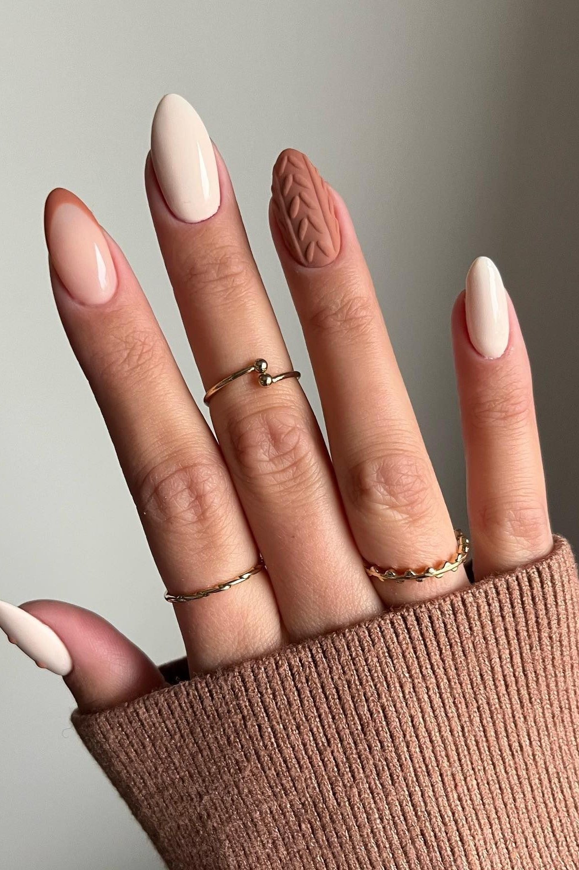 Nude pink with autumn leaf art almond, elegant fall nail design for women over 40