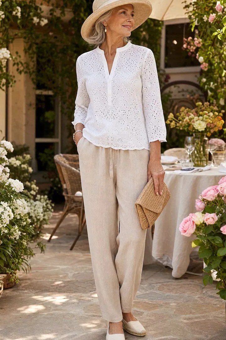 White Eyelet Blouse with Cream Trousers, classic casual outfit for women over 70