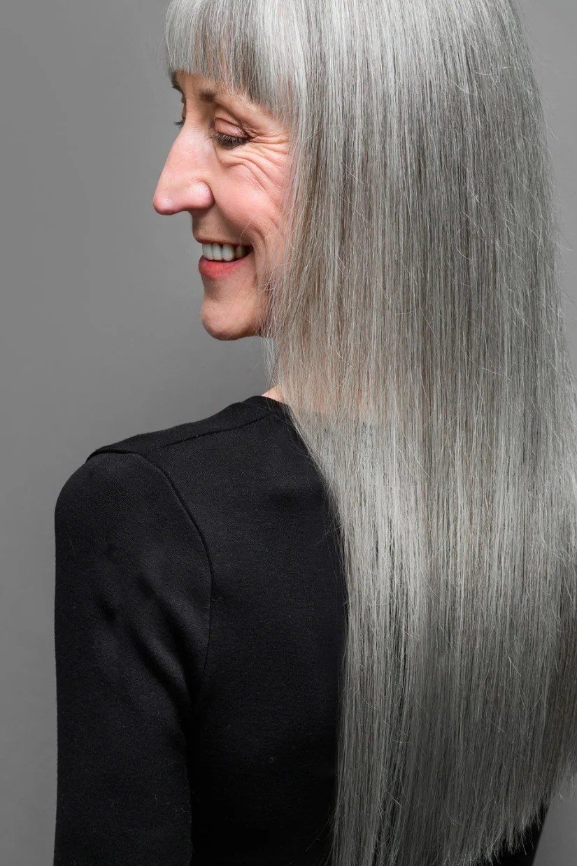 Very long sleek straight silver hair for women over 50