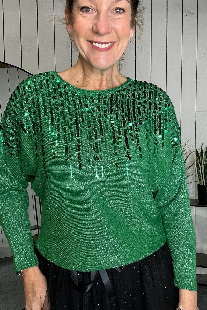 holiday evening outfit for women over 60: green sequin blouse