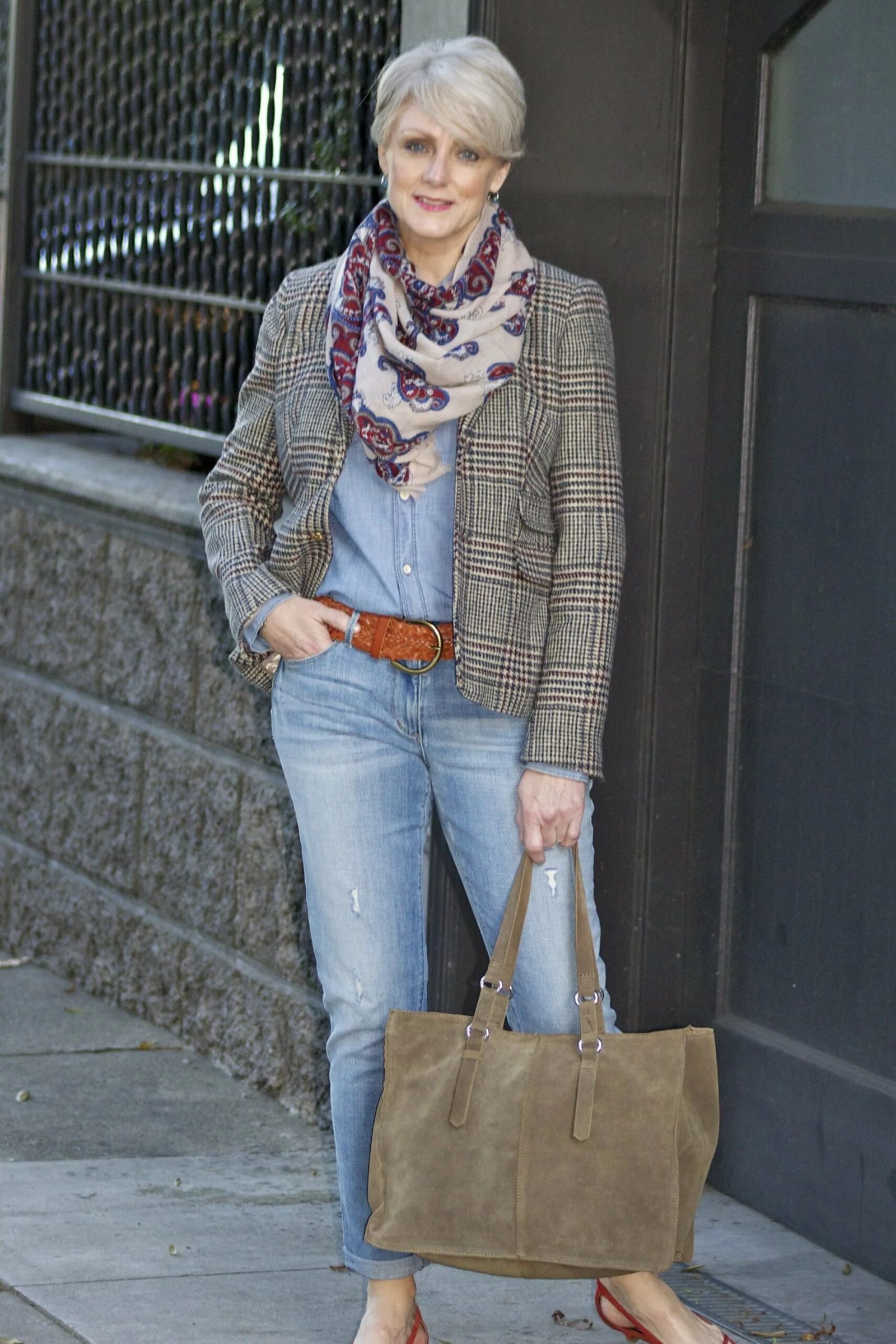 Houndstooth blazer with patterned scarf and light jeans, fall outfit for women over 50
