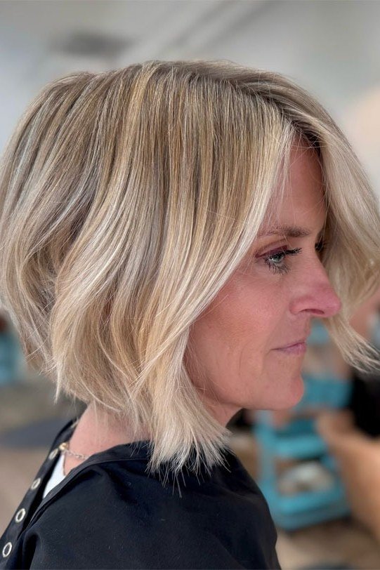Salon-Fresh Blonde Layered Bob - trendy layered bob hairstyle for women over 50