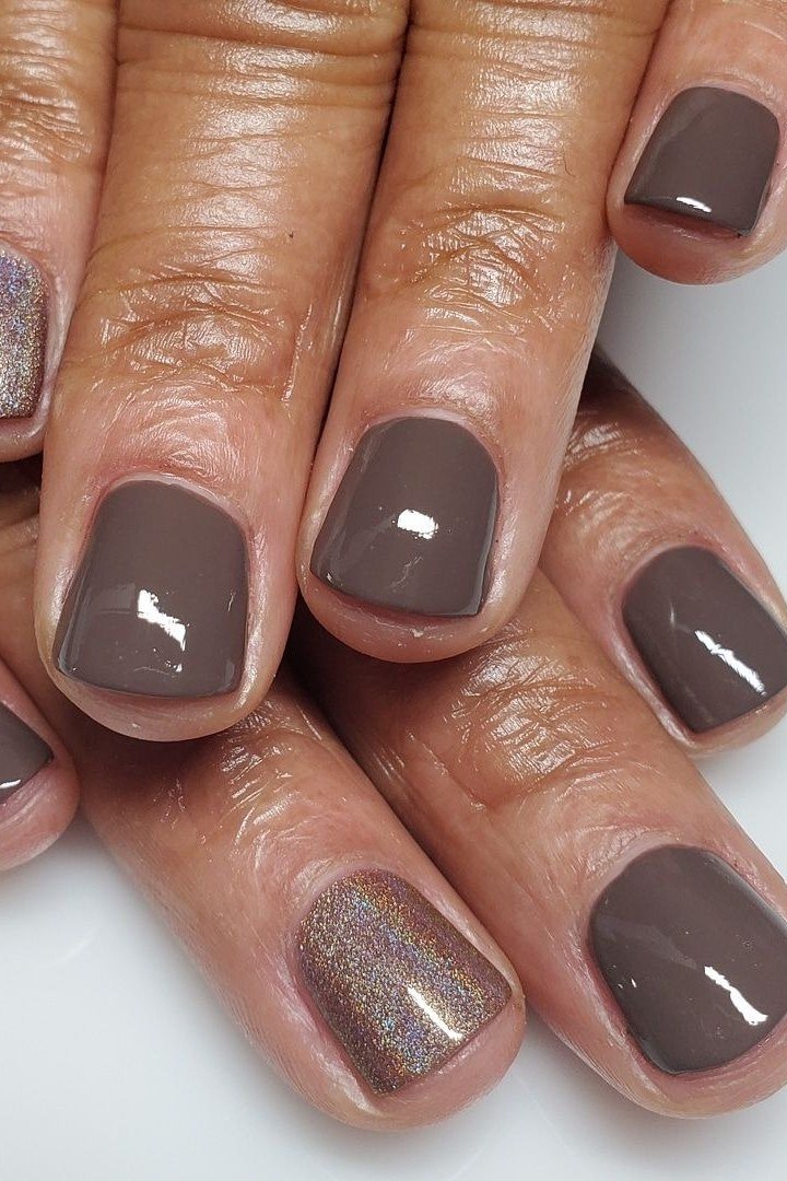 Taupe Nails with a Silver Glitter Accent, fall nail color idea for women over 50