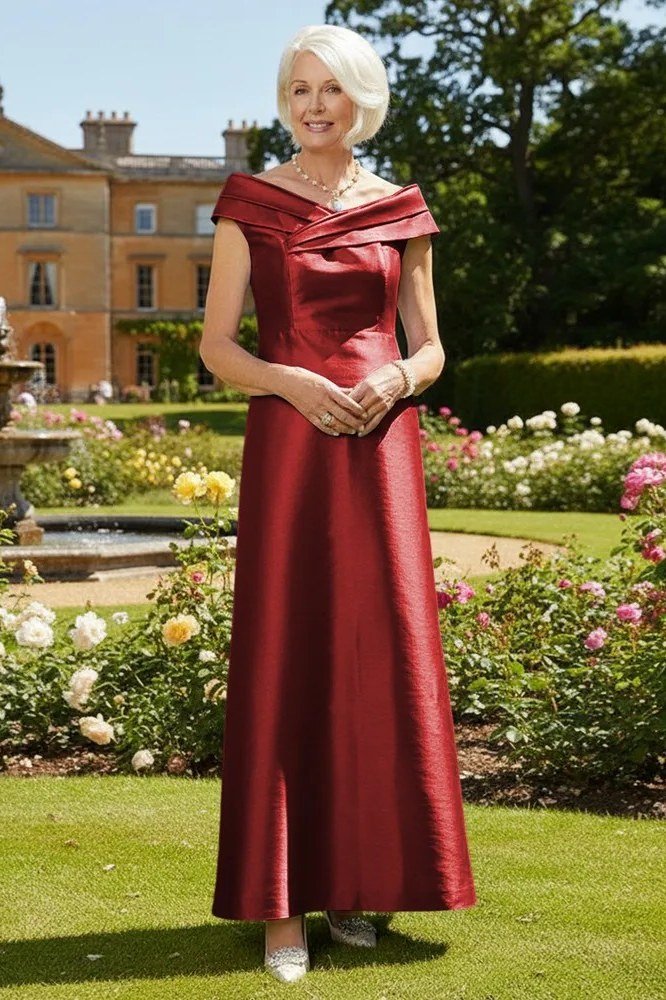 Red satin off-shoulder gown in garden for women over 50, fall date night outfit