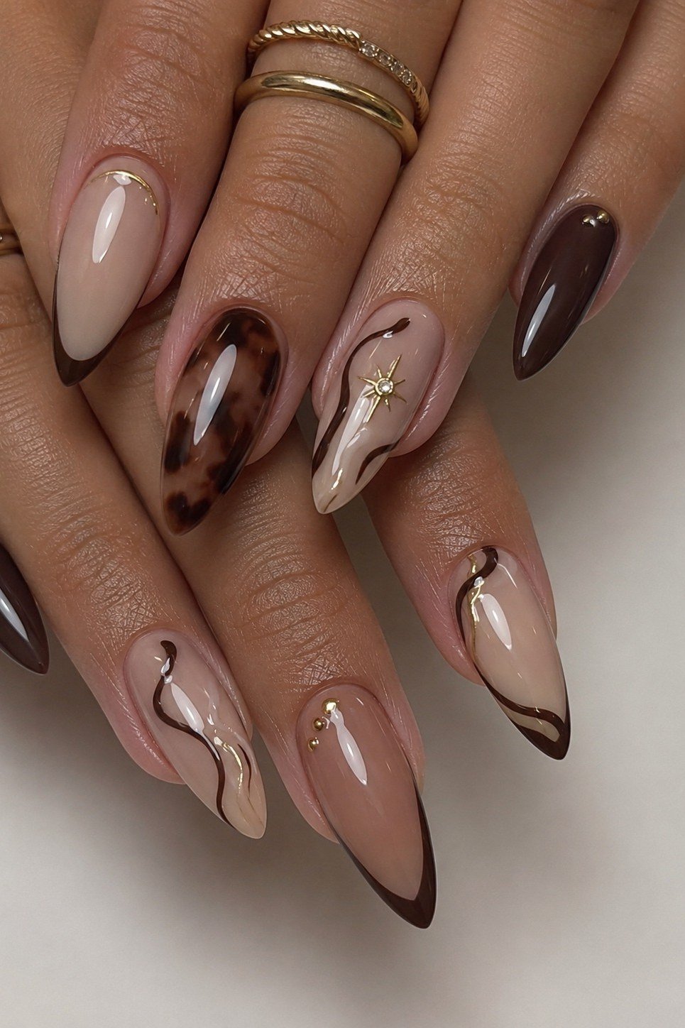 Chocolate with marble and tortoise art almond, elegant fall nail design for women over 40