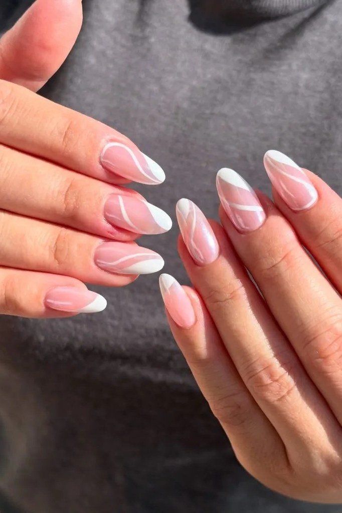 glossy pink white baby boomer fade on medium almond nails