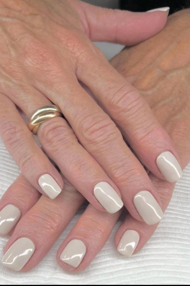 White Cream Glossy Nails, understated glam nail color for women over 60