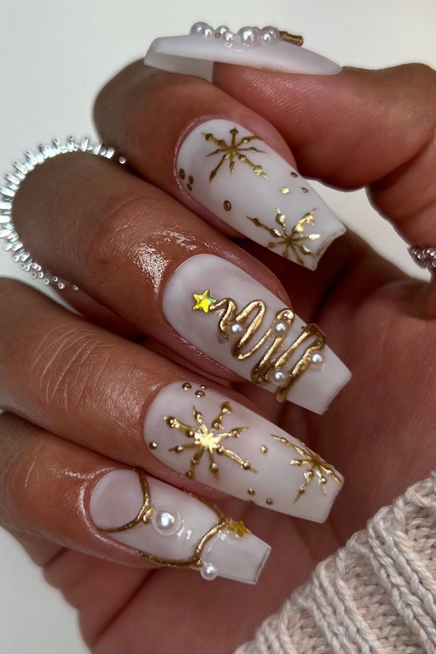 White nails with gold Christmas tree and star art - classy Christmas nail idea for women over 70