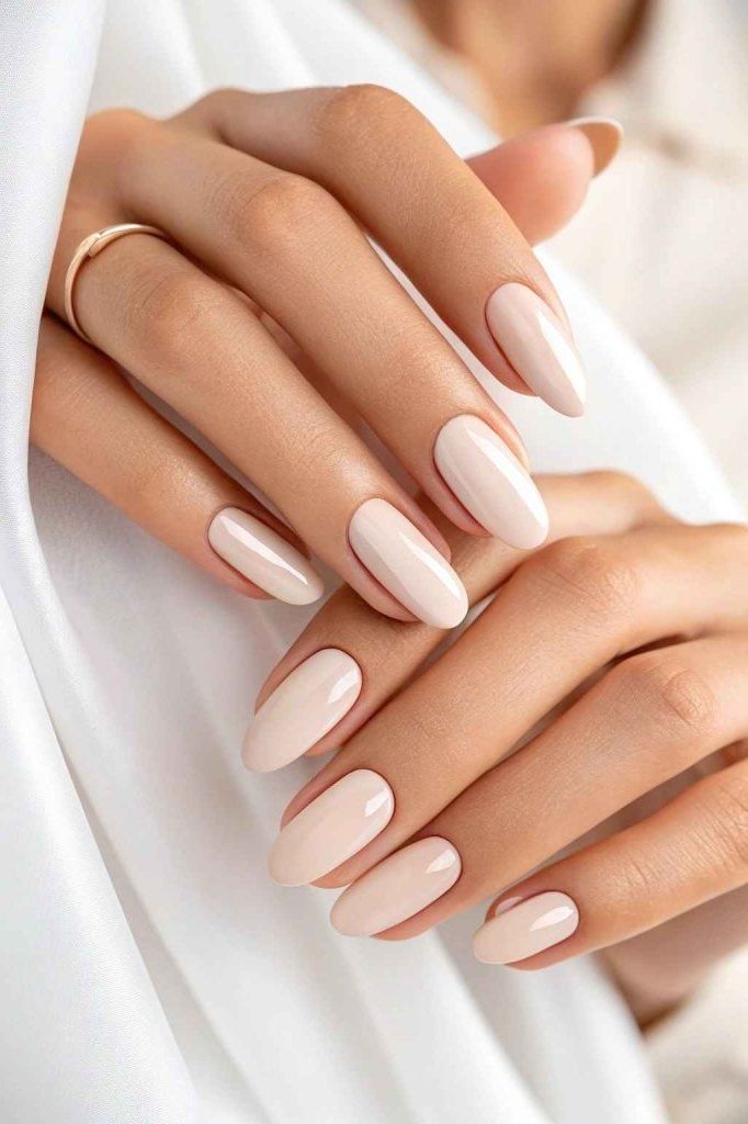 Pale pink almond nails for women over 50