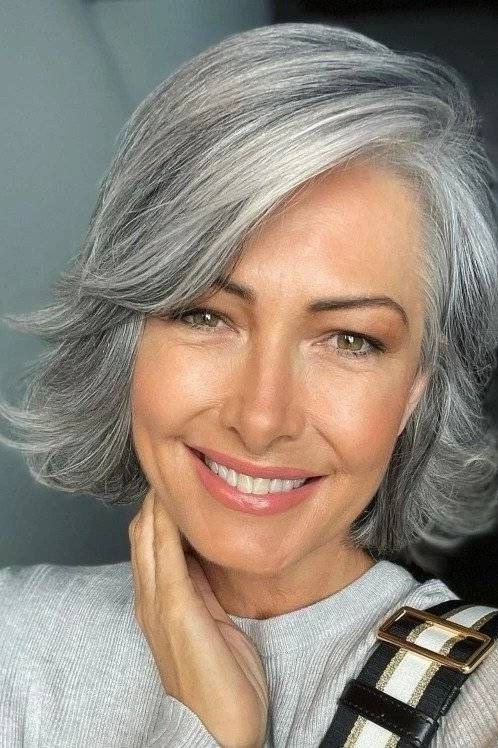 Silver textured bob, front view, smiling - wispy hairstyle for women over 40