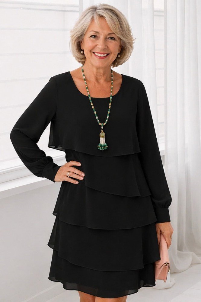 black tiered knit dress with pendant necklace for women over 60
