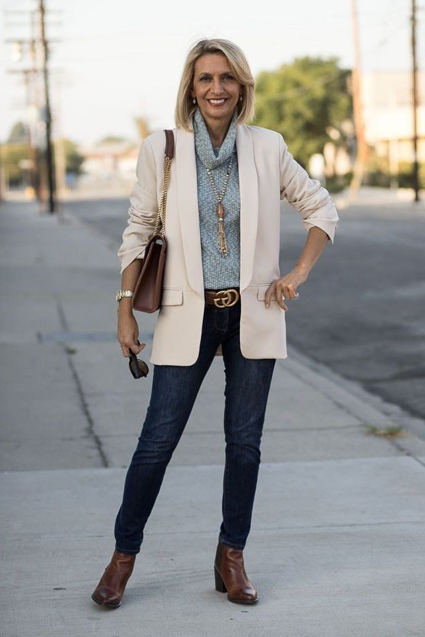 Cream blazer over chambray shirt with dark jeans for women over 60