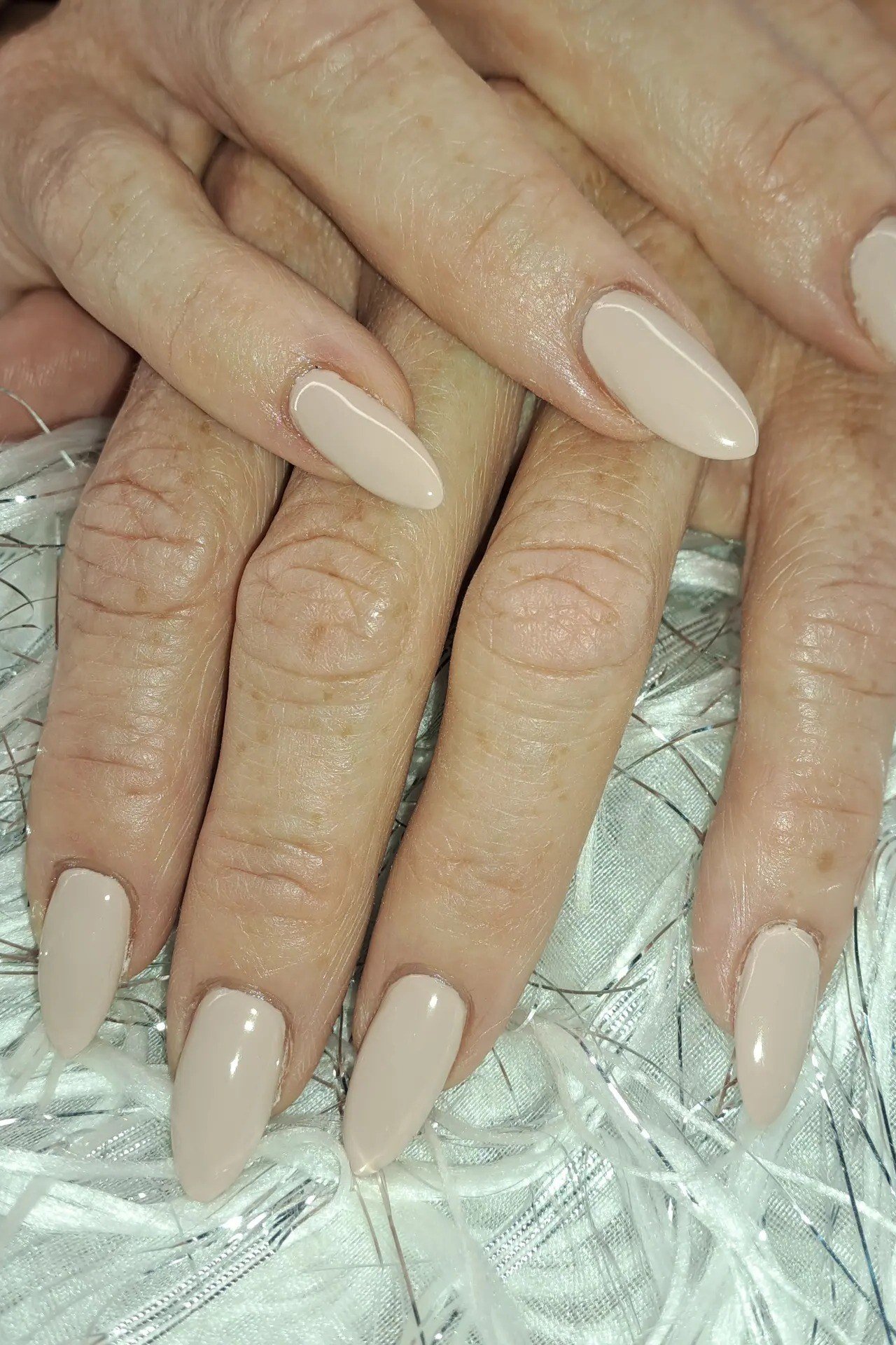 Blush pink sheer overlay natural - flattering nail design for older women