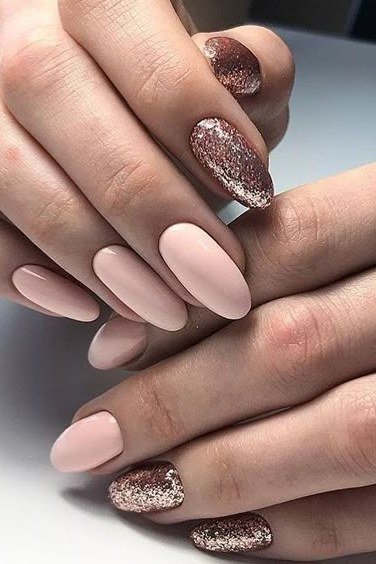 nude pink square nails with gold glitter accent nail