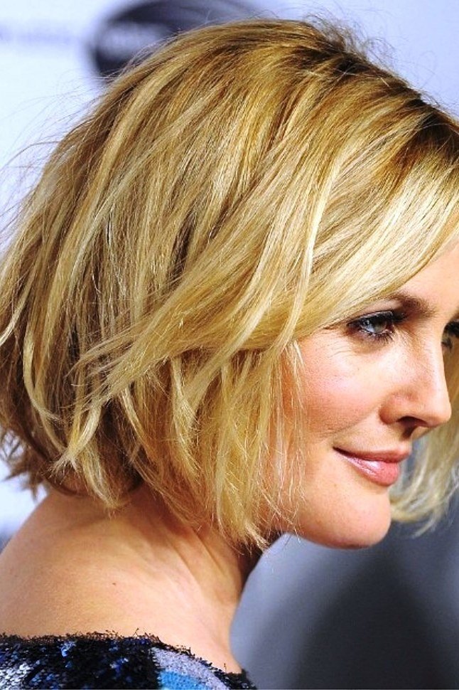 Golden Blonde Tousled Bob - trendy layered bob hairstyle for women over 50