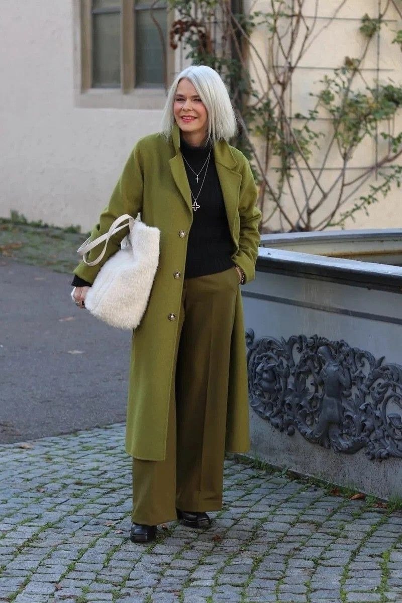 Effortlessly chic fall outfit for women over 60: olive belted coat suit