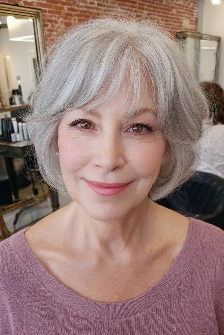 Silver bob with full bangs for women over 50