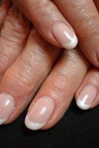 Classic French Manicure - short nail design idea for women over 50