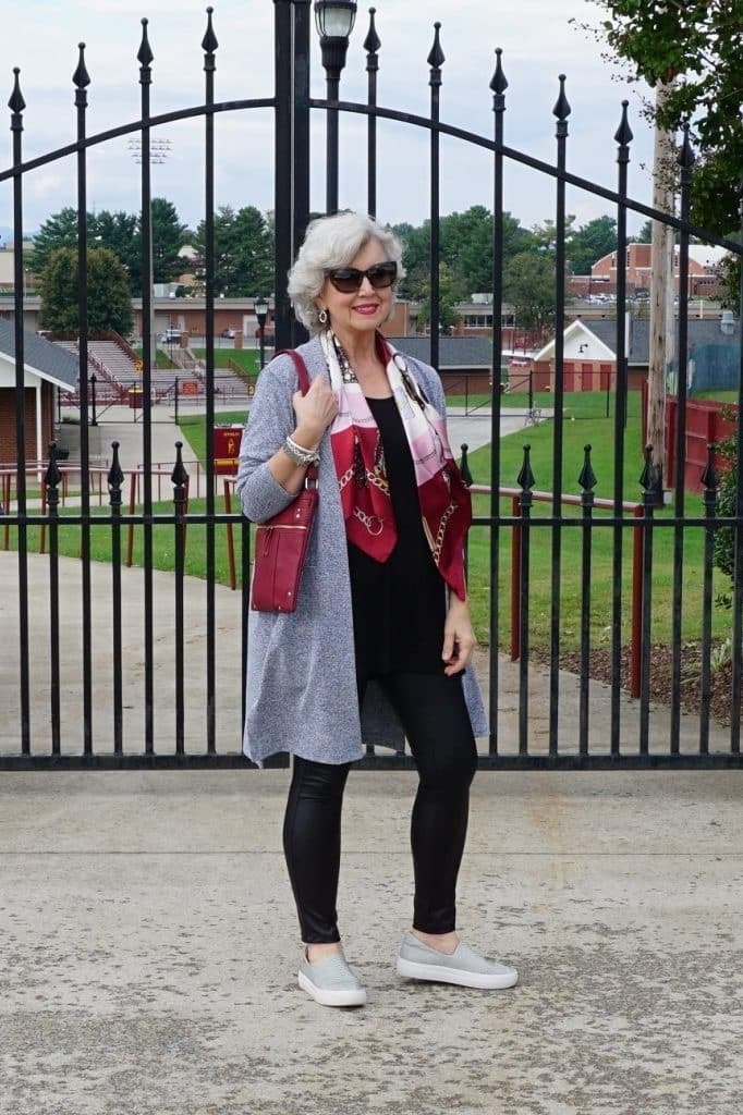 Long grey cardigan with black leggings fall outfit idea for women over 60